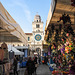 La Torre dell’Orologio dal mercato di Piazza dei Signori.