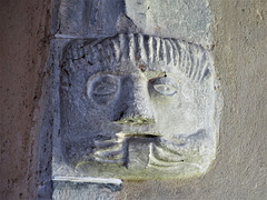 biddenden church, kent  (21)c14 headstop in the north aisle; mouth puller with tongue
