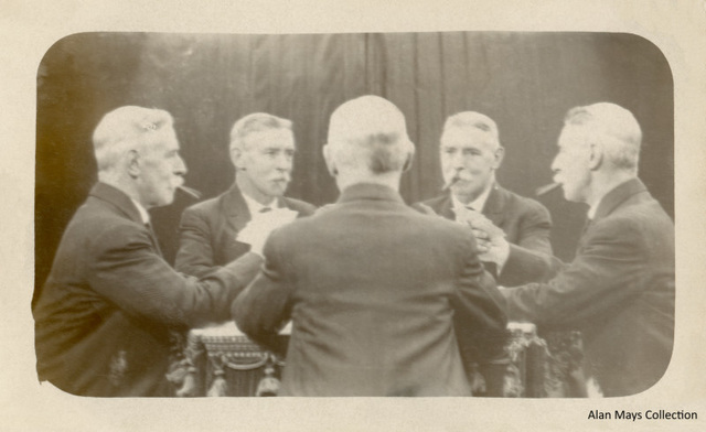 Mirror Photo of Man Smoking and Playing Cards Mirror Photo of Man Smoking and Playing Cards