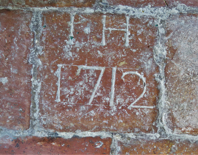 biddenden church, kent  (24)c18 brick pamments on the floor carry a date of 1712