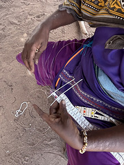 Maasai woman at work.