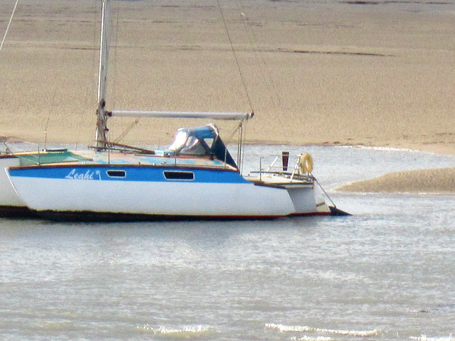 A lovely tri-maran just waiting for the tide to release him from the mud