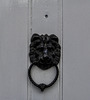 Black iron Lion head door knocker