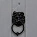 Black iron Lion head door knocker