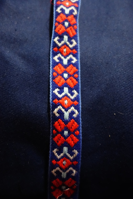 Blue with tablet woven trim