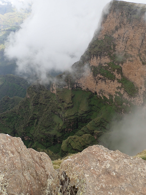 Looking over the cliff-edge on the Geech to Chenek trek in the Simien Mountains