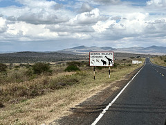 BEWARE WILDLIFE CROSSING.