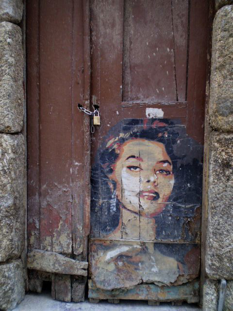 Poster on old door, by Btoy.