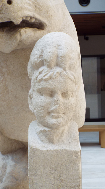 Detail of the Human Head on the Bear of Porcuna in the Archaeological Museum of Madrid, October 2022