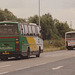 Badgerline 2206 (CSV 231,A206 SAE) and Premier Travel 330 (C330 PEW) passing through Red Lodge – 20 Aug 1988 (71-20)