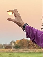 Chris' photo, holding the moon