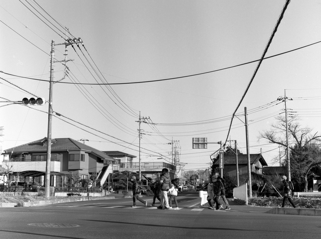 Crossing road to school