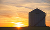 a grain bin at sunset 2