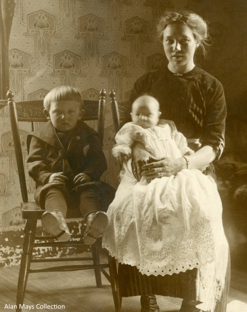 Mother with Baby and Young Son Mother with Baby and Young Son