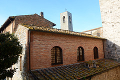 Italy, San Gimignano, Upper Levels of Museum 1300 and Bell Tower of Duomo di Santa Maria Assunta