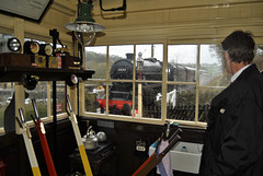 Damems signal box passing a train for Keighley