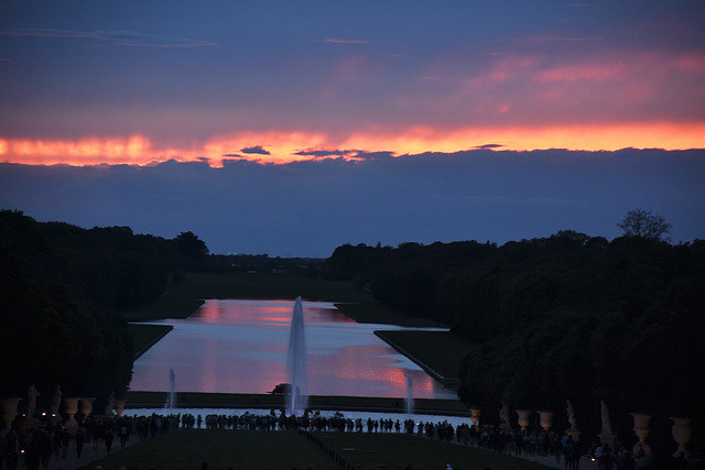 versaille les jardins au couché de soleil