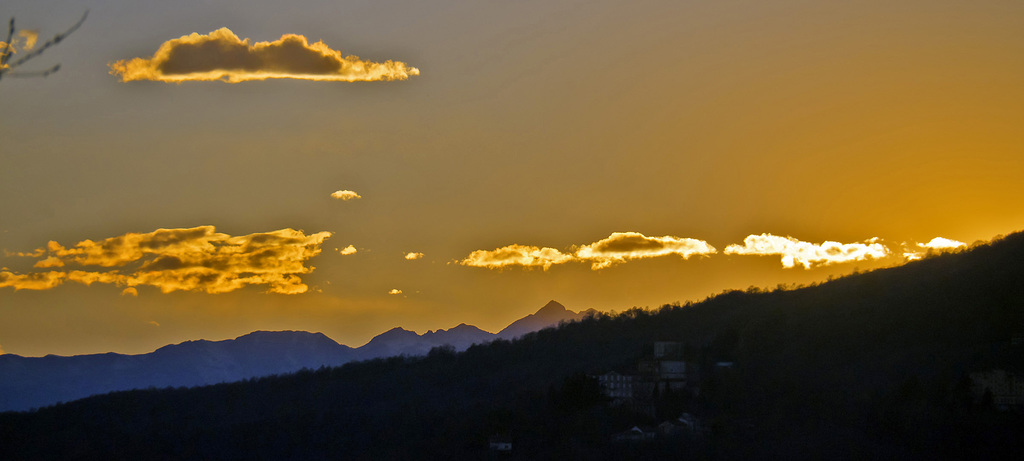 Profiles and clouds at the sunset