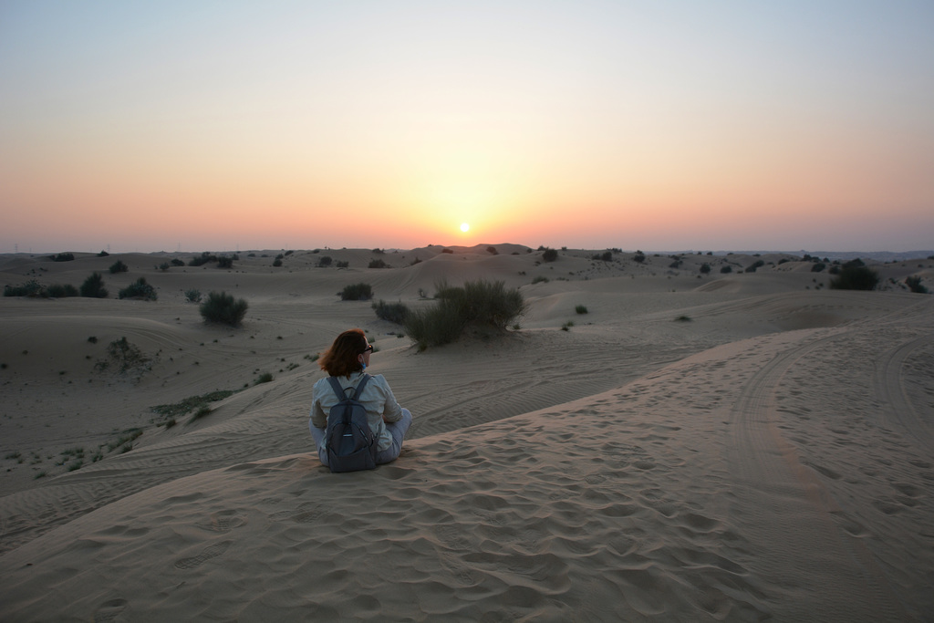 U.A.E., Dubai, Watching the Sunset over the Arabian Desert