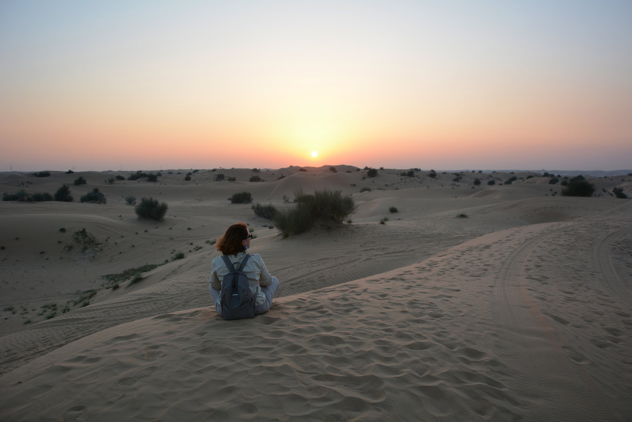 U.A.E., Dubai, Watching the Sunset over the Arabian Desert