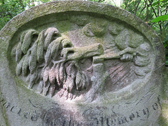 abney park cemetery, london,god axes a tree on the 1850 gravestone to john oliver