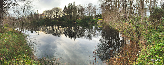 The Loch and boathouse on the Earl of Seafield's estate