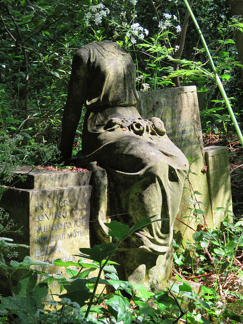 abney park cemetery, london,pert( if headless) girl on 1935 elsey family memorial