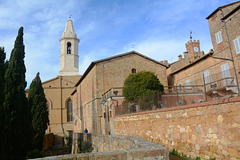 Italy, Pienza, Duomo di Santa Maria Assunta and the Top of Clock Tower of Palazzo Piccolomini