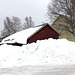 snow slipping off rooves