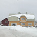 snow slipping off rooves