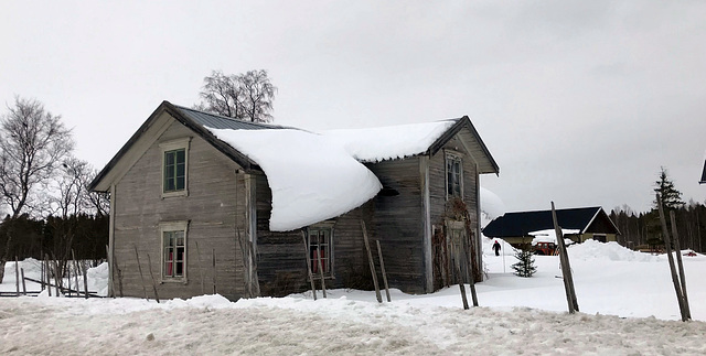 snow slipping off rooves