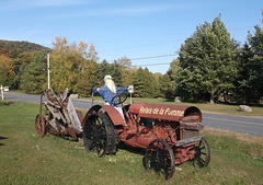 Halloween farmer on his tractor