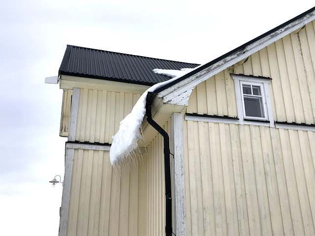 snow slipping off rooves