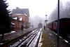 A train emerges from the mist into  Drei Annen Hohne station