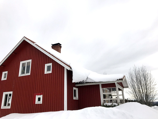 snow slipping off rooves