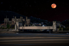 The moon and stars with Conway Castle.