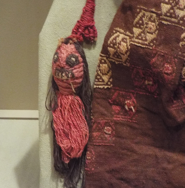 Detail of a Peruvian Figure Holding a Trophy Head in the Virginia Museum of Fine Arts, June 2018