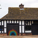 Thornton Hough blacksmiths shop, the rainbow is made of horseshoes