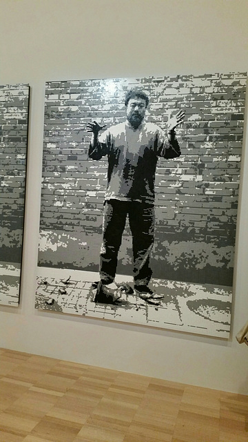 Ai Wei-Wei drops an ancient pot. Mural made in Lego