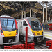 Greater Anglia Stadler 745  ‘Flirt’ intercity train on the left, with Alstom 720 ‘Aventra’ commuter train - Liverpool Street Station - 25 2 2023