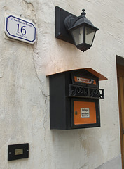 Postbox, number and lamp at Gavinana