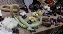 Several kinds of pumpkins, cucumbers and eggplants.