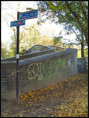 tacky signpost spoils old bridge