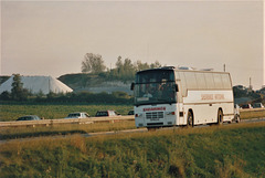 Ambassador Travel 130 (H176 EJU) on the A11 at Chalk Hill near Barton Mills – 1 Sep 1991 (148-2)