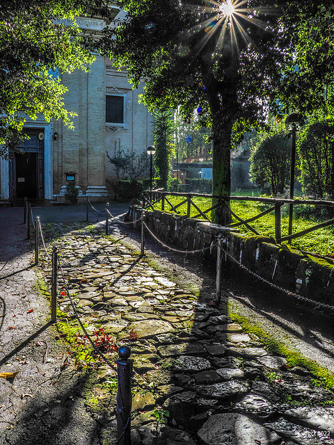 Abbazia delle Tre Fontane. Il viale del martirio di San Paolo. Lastricato romano.