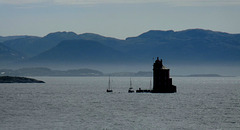 Kjeungskjaer Lighthouse and Misty Mountains