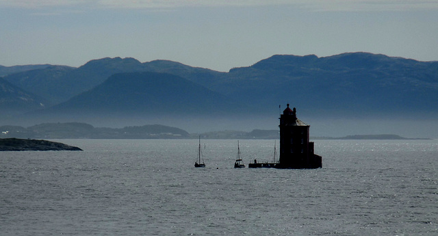 Kjeungskjaer Lighthouse and Misty Mountains