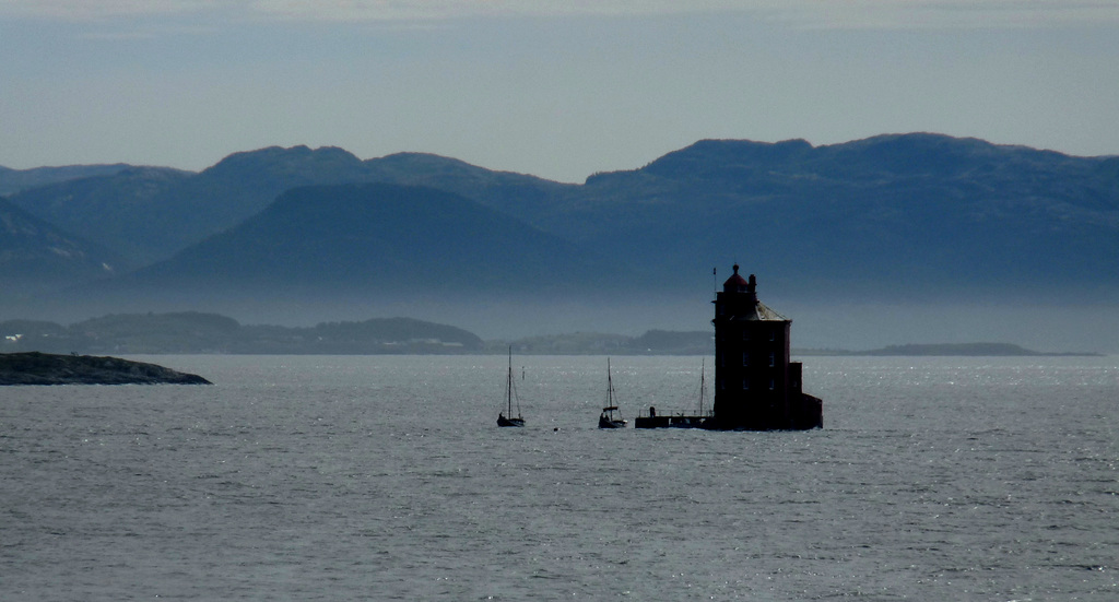 Kjeungskjaer Lighthouse and Misty Mountains