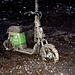 Electric scooter left to rot in the mud.