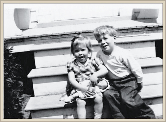 Steffy and CJ on front steps 1014